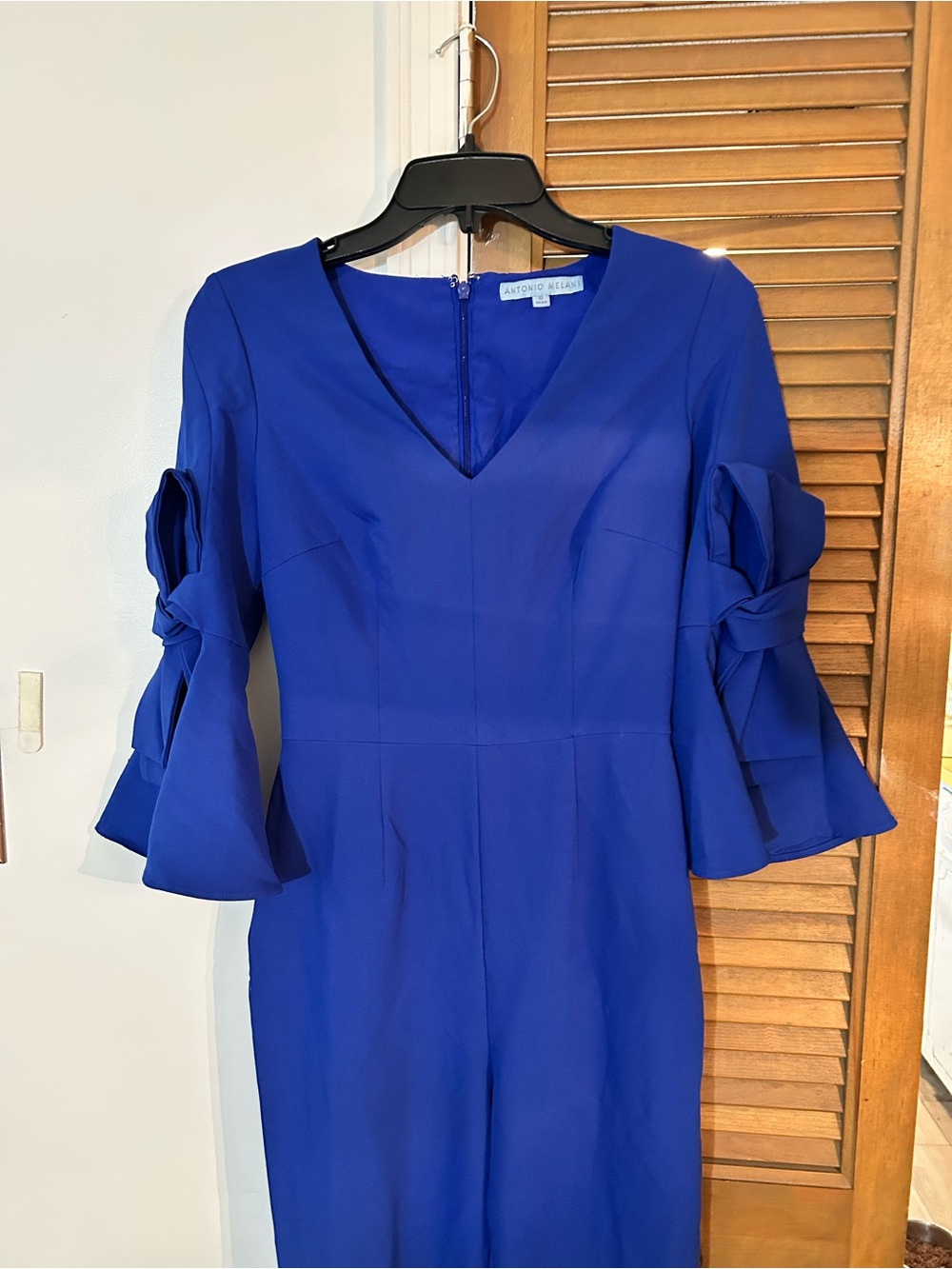 ANTONIO MELANI Royal Blue V-Neck Jumpsuit with Tie Sleeve Detail